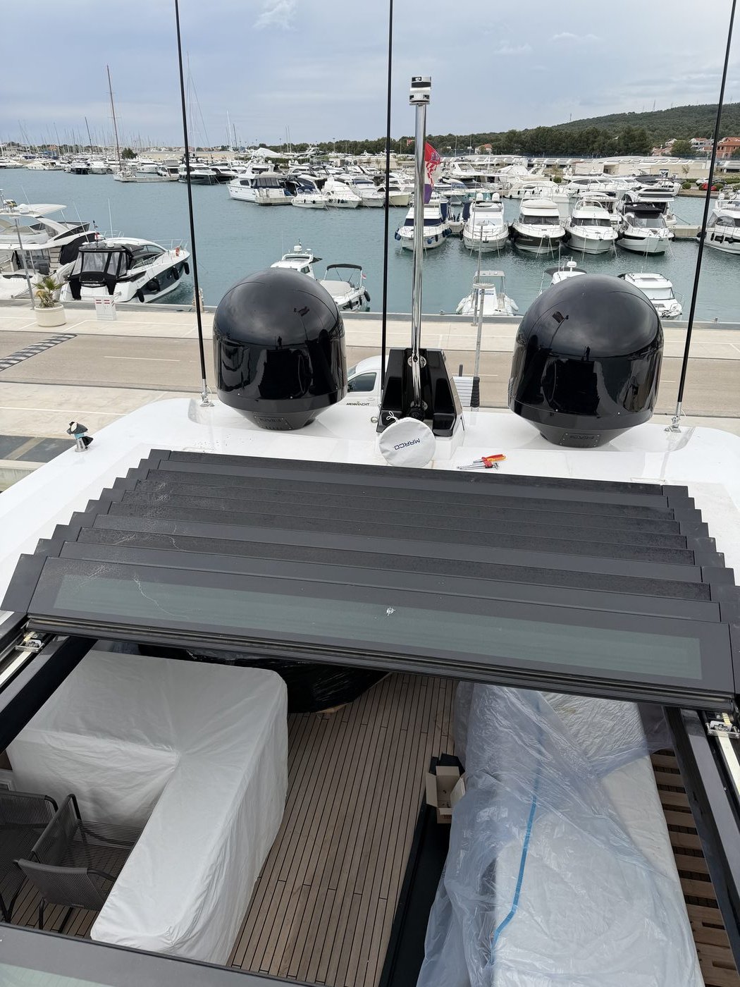 Satellite domes on a yacht, marina — marine electronics work